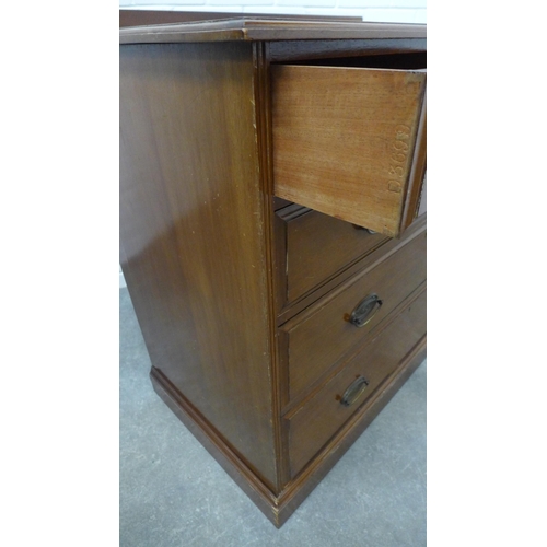 209 - Mahogany ledgeback chest with two short and three graduating long drawers, John Taylor & Sons, 96 x ... 