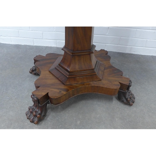 210 - 19th century mahogany tea table, foldover rectangular top over a frieze with carved acanthus leaves ... 