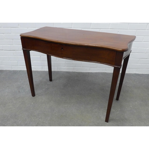 221 - Late 19th century mahogany side / writing table, with lift up serpentine top revealing a void interi... 