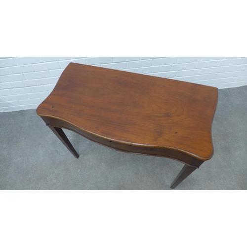 221 - Late 19th century mahogany side / writing table, with lift up serpentine top revealing a void interi... 