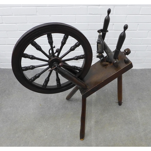 231 - Dark wood spinning wheel, 84 x 76cm