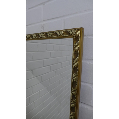 244 - Gilt framed wall mirror with rectangular glass plate, 110 x 40cm