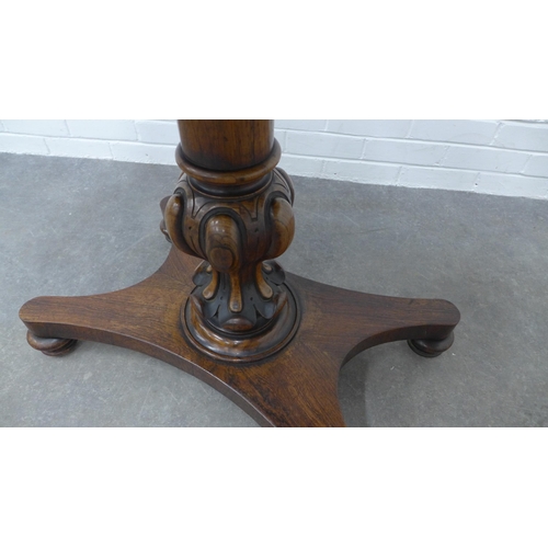 250 - William IV rosewood fold over tea table, rectangular top raised on a lobed baluster column with quad... 