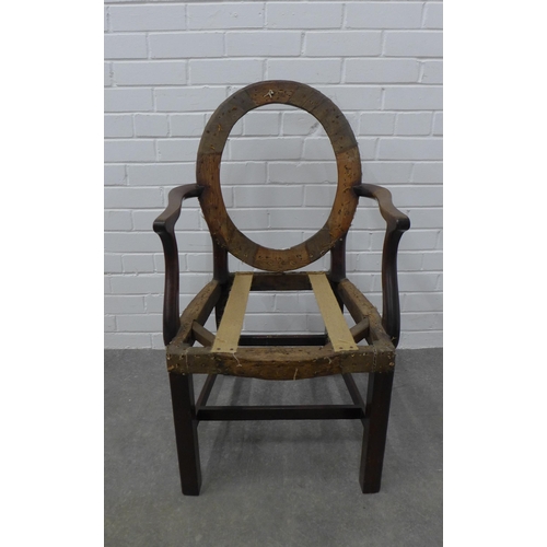 255 - George III mahogany armchair frame with curved oval back and serpentine seat with open scroll arms. ... 