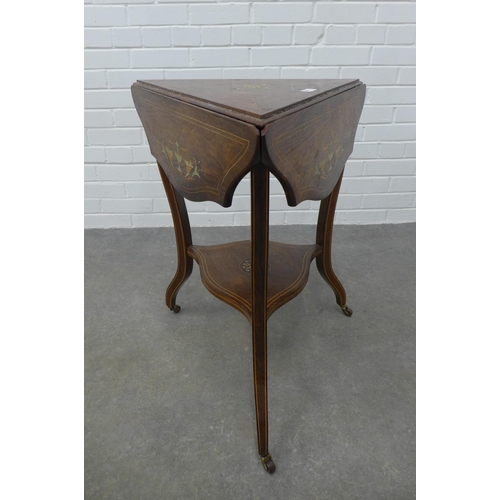 257 - Edwardian inlaid envelope table with undertier, raised on tapering legs with ceramic castors, 71 x 7... 