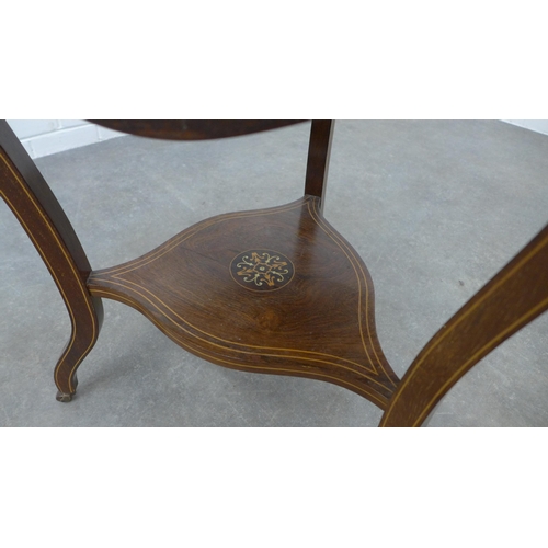 257 - Edwardian inlaid envelope table with undertier, raised on tapering legs with ceramic castors, 71 x 7... 