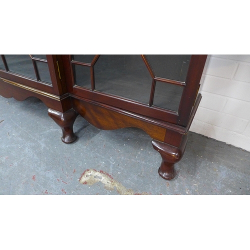 262 - Late 19th / early 20th century mahogany breakfront bookcase with four astragal glazed doors, shelved... 