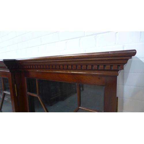 262 - Late 19th / early 20th century mahogany breakfront bookcase with four astragal glazed doors, shelved... 