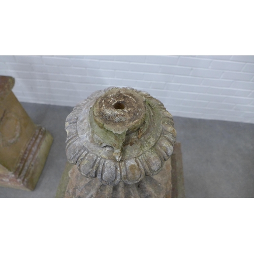 283 - Pair of large garden urns on stands. (one is A/F) 123 x 58cm. (2)