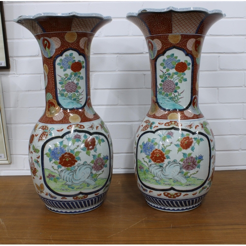 287 - Pair of Japanese Imari vases of large size, with frilled rims and landscape pattern, character marks... 