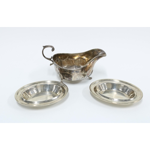 30 - George V silver sauce boat, Sheffield 1915 and a pair of 19th century silver dishes, London 1801, al... 