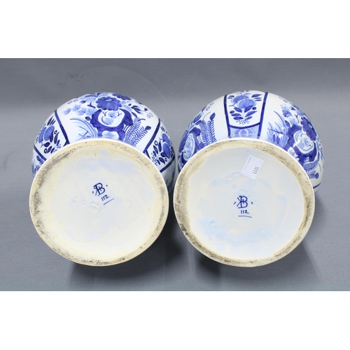 388 - Pair of Delft blue and white gourd vases, 40cm (2)