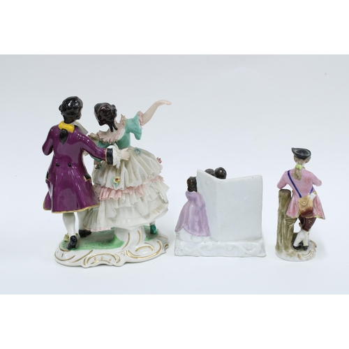 426 - The Power of Love Victorian fairing group, Dresden porcelain figure and another, tallest 15cm (3)