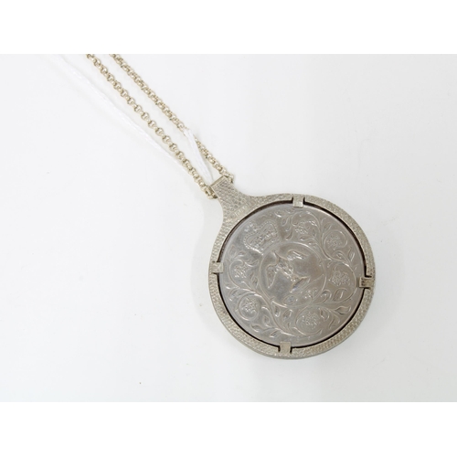 44 - QEII Silver Jubilee commemorative coin in a silver mount suspended on a silver chain