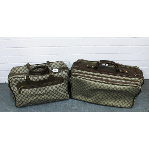 455 - Vintage Gucci leather and canvas luggage to include a medium soft body suitcase with two front pouch... 