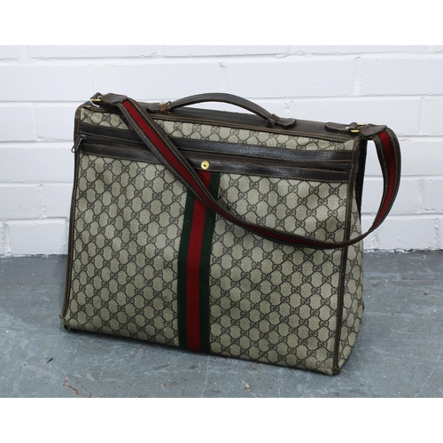 456 - Vintage Gucci soft body canvas and leather weekend travel bag, with GG monogram and green and red br... 