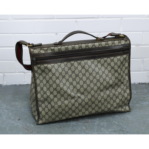 456 - Vintage Gucci soft body canvas and leather weekend travel bag, with GG monogram and green and red br... 