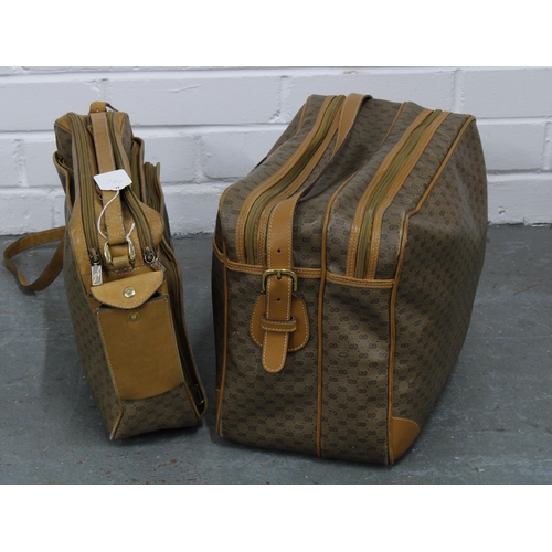 457 - Two vintage Gucci monogrammed weekend travel bags, monogrammed throughout with tan leather straps, (... 