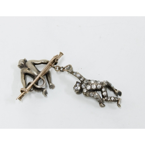 47 - Late 19th / early 20th century double monkey trapeze brooch, each monkey pave set with paste stones,... 