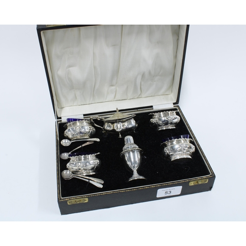 53 - Four Edwardian silver salts with blue glass liners, Birmingham 1909 together with a silver mustard a... 