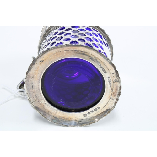 63 - Victorian silver drum mustard with pierced circular decoration, blue glass liner and shaped thumbpie... 