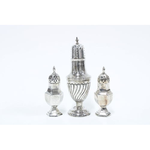 64 - Victorian silver castor, Birmingham 1894, 12cm tall together with a pair of miniature silver castors... 