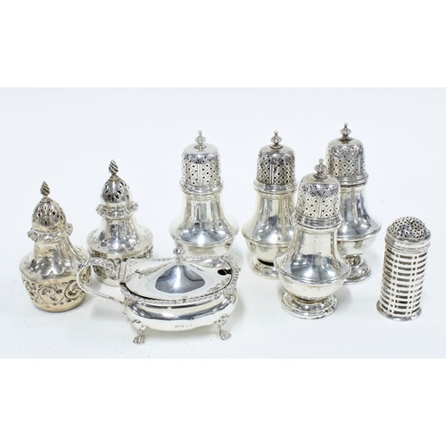 97 - Set of four silver pepper pots, Chester 1928, pair of London silver pepper pots, a Walker & Hall sil... 