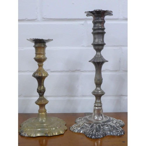 107 - Georgian silver candlesticks to include a pair of Irish candlesticks and a set of four London silver... 