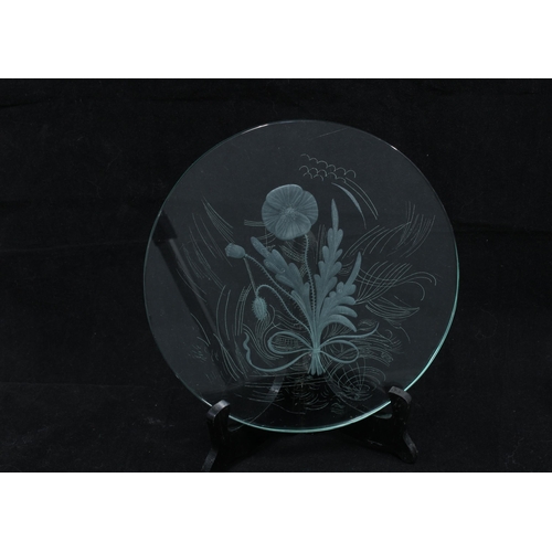 101 - Set of six early 20th century glass plates, each with an etched floral pattern (6)