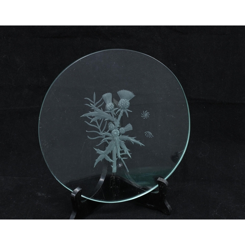 101 - Set of six early 20th century glass plates, each with an etched floral pattern (6)