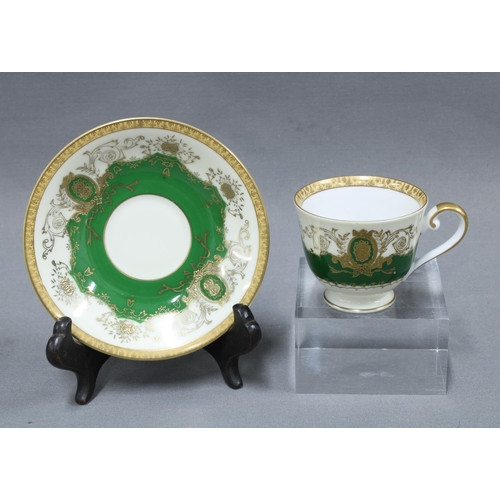 105 - Japanese porcelain coffee set, green and white ground with gilt highlights, 12 place setting