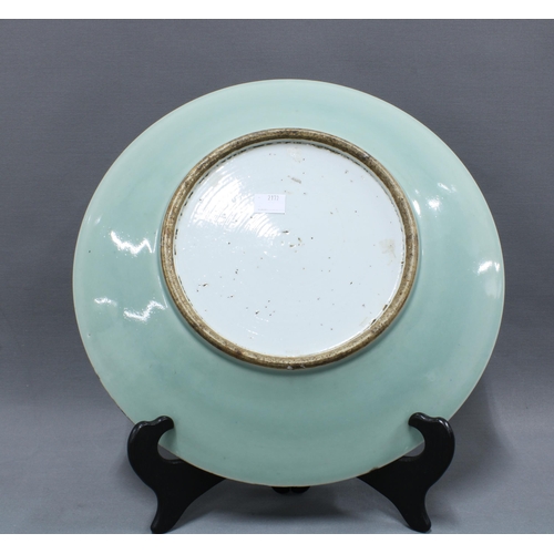 114 - Chinese celadon charger with an incised floral pattern, 34cm