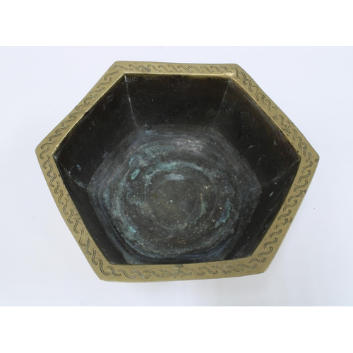 146 - Chinese brass / bronze hexagonal bowl with character marks to the base, 26cm