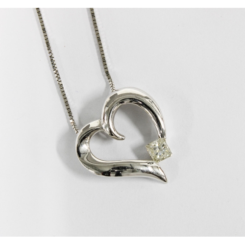 17 - 18ct white gold diamond heart pendant on an 18ct white gold chain, stamped 2000, 750