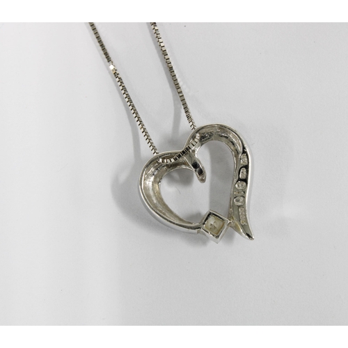 17 - 18ct white gold diamond heart pendant on an 18ct white gold chain, stamped 2000, 750