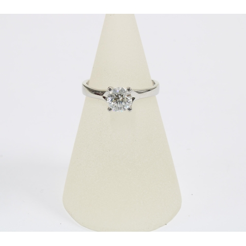 18 - Platinum diamond solitaire ring, the claw set round brilliant cut diamond is approx 0.70ct, stamped ... 