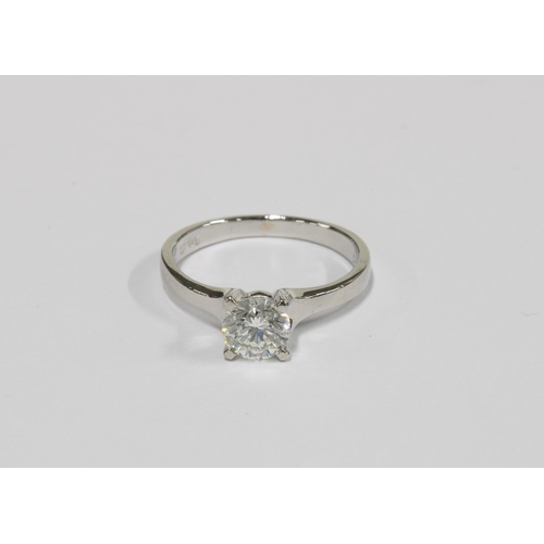 18 - Platinum diamond solitaire ring, the claw set round brilliant cut diamond is approx 0.70ct, stamped ... 