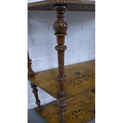 202 - Rosewood three tier whatnot, the shelves inlaid with a classical urn pattern, with turned supports, ... 