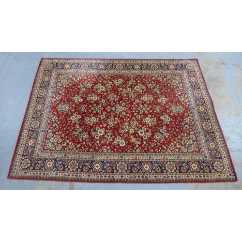 216 - Belgian wool rug, red foliate field. 232 x 172cm.