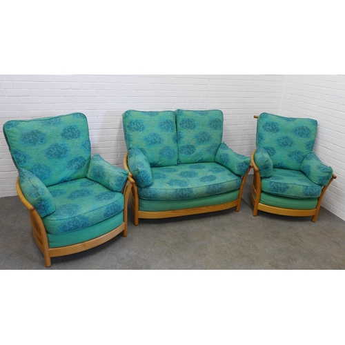 218 - Ercol light elm Renaissance three piece lounge suite comprising a two seater settee and two armchair... 