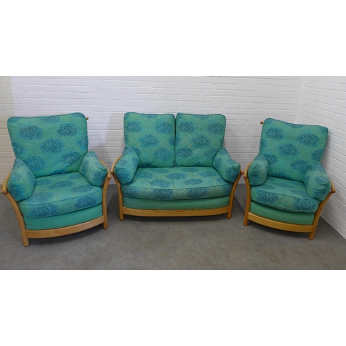 218 - Ercol light elm Renaissance three piece lounge suite comprising a two seater settee and two armchair... 