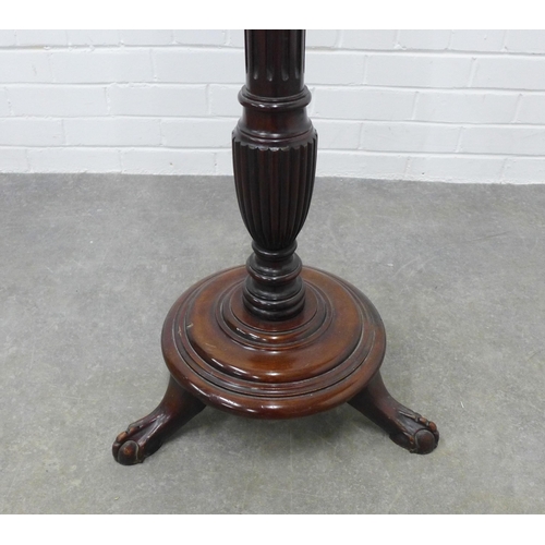 264 - Mahogany torchere, circular top on a fluted column 152 x 46cm