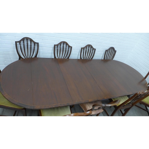 279 - Twin pedestal dining table with two sets of four mahogany chairs, 72 x 267 x 104cm (7)