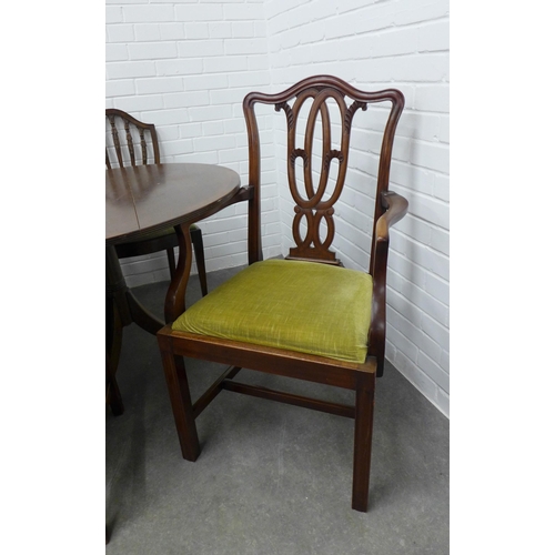 279 - Twin pedestal dining table with two sets of four mahogany chairs, 72 x 267 x 104cm (7)