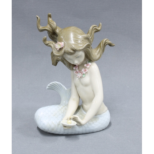 308 - Mirage, a Lladro mermaid with pearl, 13cm