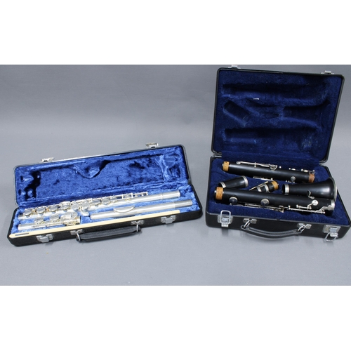 310 - Two cased instruments to include a flute and a clarinet (2)