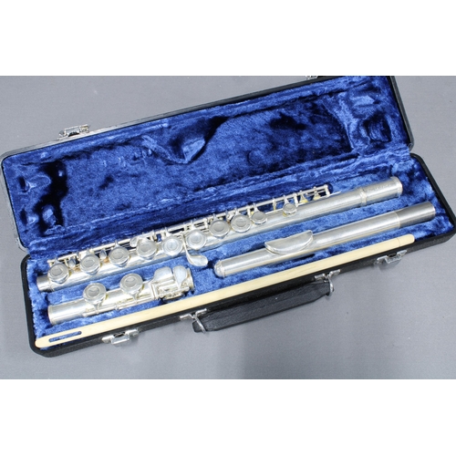 310 - Two cased instruments to include a flute and a clarinet (2)