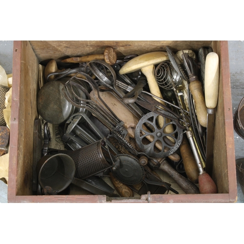 317 - A large collection of vintage kitchenalia to include whisks, butter pats, piping instruments, etc (a... 