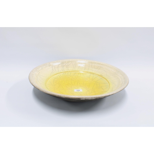 326 - John Dunn, a large studio pottery bowl with yellow and grey craquelure pattern, signed to base, 45cm