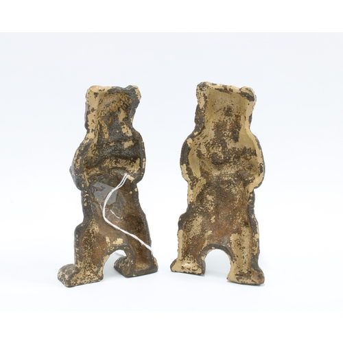 337 - A pair of late 19th / early 20th century cast iron bears, with remnants of paint, 15cm